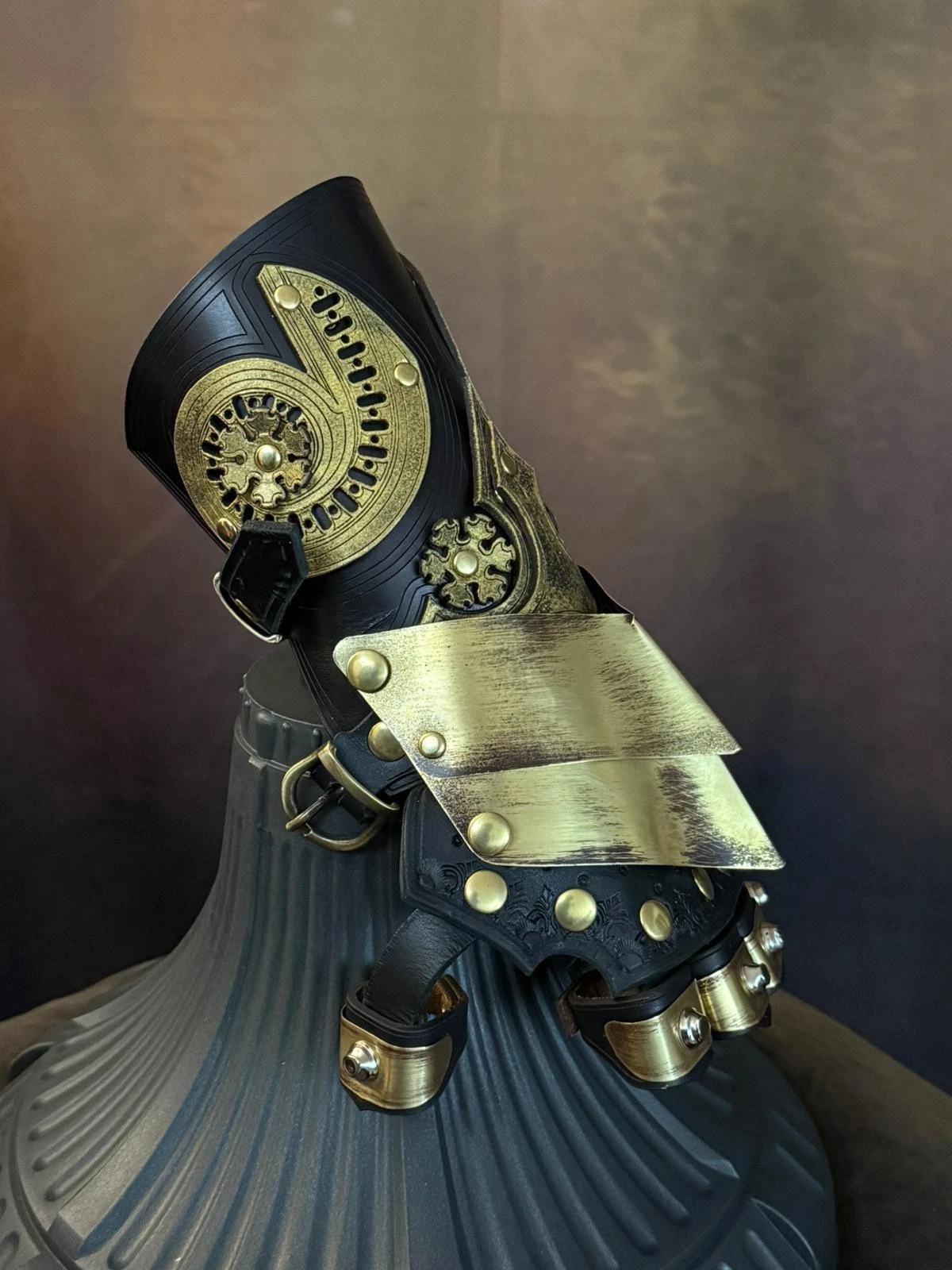 Baroque Steampunk Gauntlet 2 Baroque steampunk gauntlet in brass and leather with ornate decorations